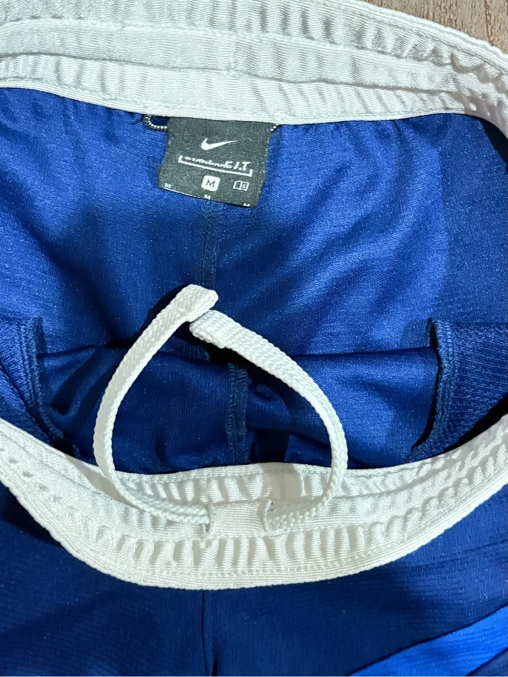 Nike Royal Blue Kids Athletic Shorts with Light Blue Swoosh and White Waistband